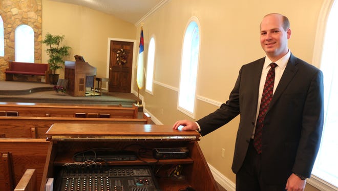 The Rev. Ben Lauritzen is the pastor of Bible Missionary Church in Monroe. He had the church's sound board moved toward the front so the person working the music could be a part instead of being in the back or behind a screen.