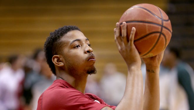 Indiana Hoosiers forward Devin Davis (15)  shoots around with the team before their game against the Michigan State Spartans Saturday, March 7, 2015, afternoon at Assembly Hall in Bloomington IN.