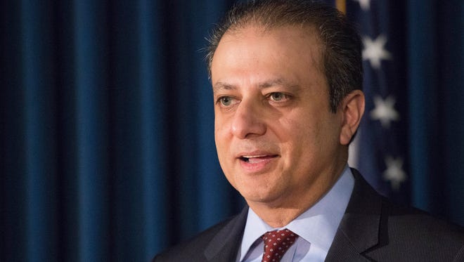 FILE - In this Wednesday, Dec. 21, 2016, file photo, United States District Attorney Preet Bharara announces charges in New York, against Navnoor Kang, a former portfolio manager at the New York State Common Retirement Fund, and two broker-dealers, Deborah Kelley and Gregg Schonhorn, for participating in a "pay-for-play" scheme. Bharara launched a new personal Twitter feed, and one of his first posts was a reference to decade-old "political interference" at the Department of Justice. (AP Photo/Mark Lennihan, File)