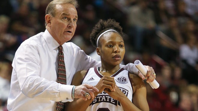 Mississippi State head basketball coach Vic Schaefer talks with Morgan William during a recent game.