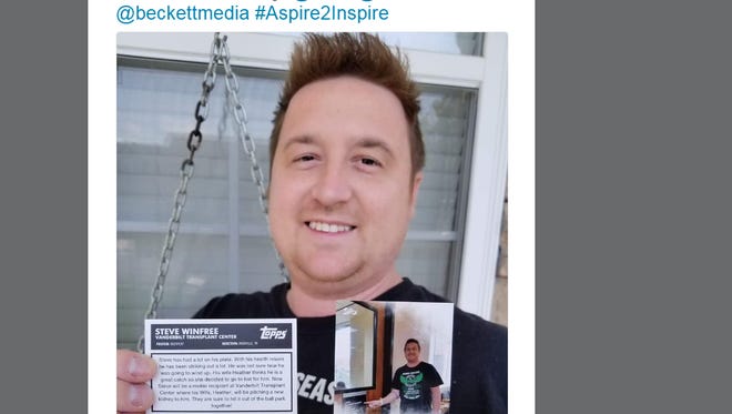 Steve Winfree holds up his custom Topps baseball card in a post on his Twitter account.