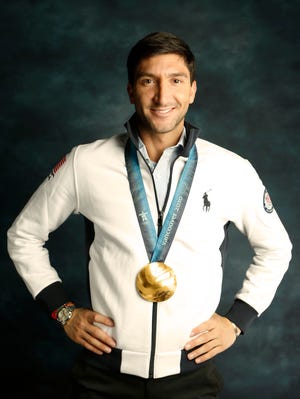 Evan Lysacek poses during a portrait session during the Team USA Media Summit at Canyons Grand Summit Hotel in Park City, Utah, on Monday.