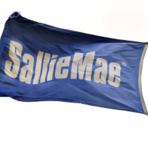 A flag flies outside a Sallie Mae building in...