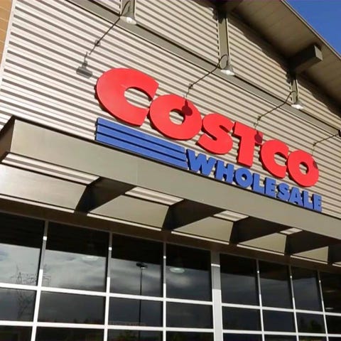Storefront of Costco as seen from outside, with br