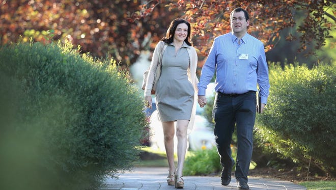 Dave Goldberg and his wife, Facebook COO Sheryl Sandberg, shown here during a conference in Sun Valley, Idaho, last summer.