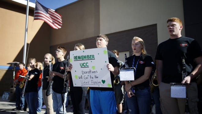 The Roseburg High School band performs on Oct. 3, 2015, to collect donations for families of the victims of the Umpqua Community College shooting in Roseburg, Ore.