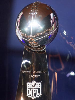 The Vince Lombardi Trophy is on display during the NFL Experience at Phoenix Convention Center.