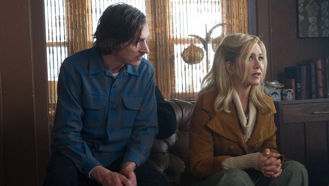 This image released by Roadside Attractions shows John Hawkes, left, and Jennifer Aniston in a scene from "Life of Crime."