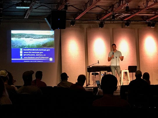 Henz gives a presentation during MonsoonCon at the