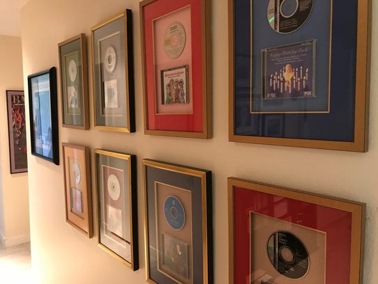 Framed CDs recorded by pianist/composer John Bayless