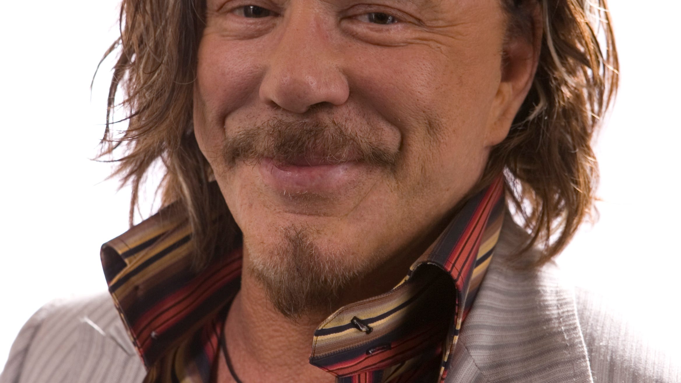 The many faces of Mickey Rourke