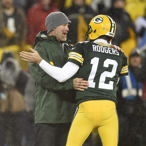 Green Bay Packers legend Brett Favre hugs quarterb