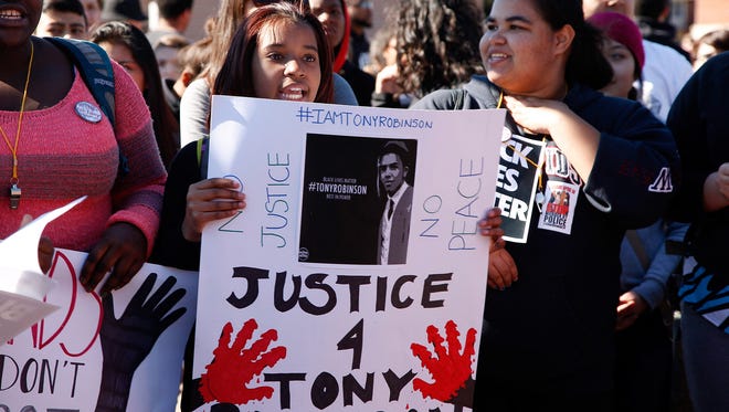 Protesters at rally at Worthington Park in Madison, Wis., on Wednesday, March 11, 2015. They were demonstrating in support of Tony Robinson, 19, who was killed by a police officer Friday, March 6, 2015.