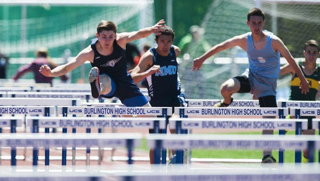 Mount Mansfield's Alec Eschholz competes in the 110m hurdles race during the high school track and field state championship meet at Burlington High School on Saturday June 6, 2015 in Burlington, Vermont.