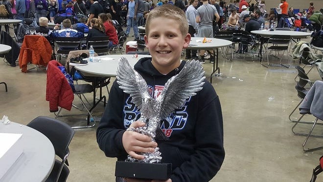 Kallan Baker, a fifth grader at Carson Elementary, became the Newark youth wrestling program's first national champion recently in East Lansing, Michigan.