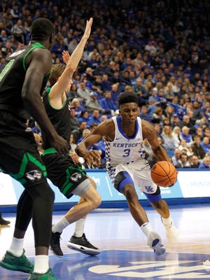 Kentucky Wildcats guard Hamidou Diallo (3) dribbles the ball against Utah Valley Wolverines forward Isaac Neilson (22) In the first half at Rupp Arena in Lexington, Kentucky, on Friday, Nov. 10, 2017.