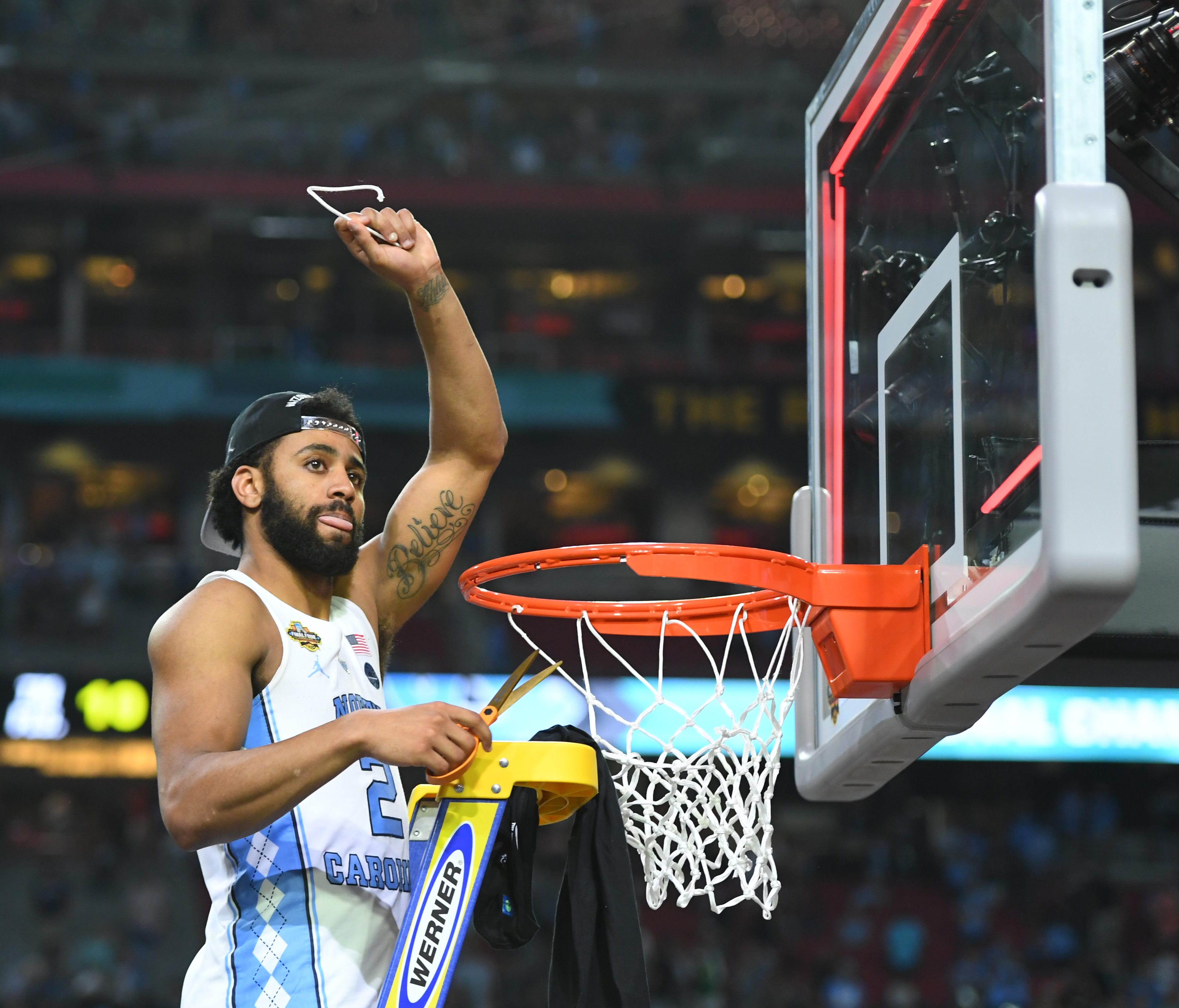 North Carolina guard Joel Berry II cuts down the net after the Tar Heels beat Gonzaga to win the 2017 NCAA men's basketball title.