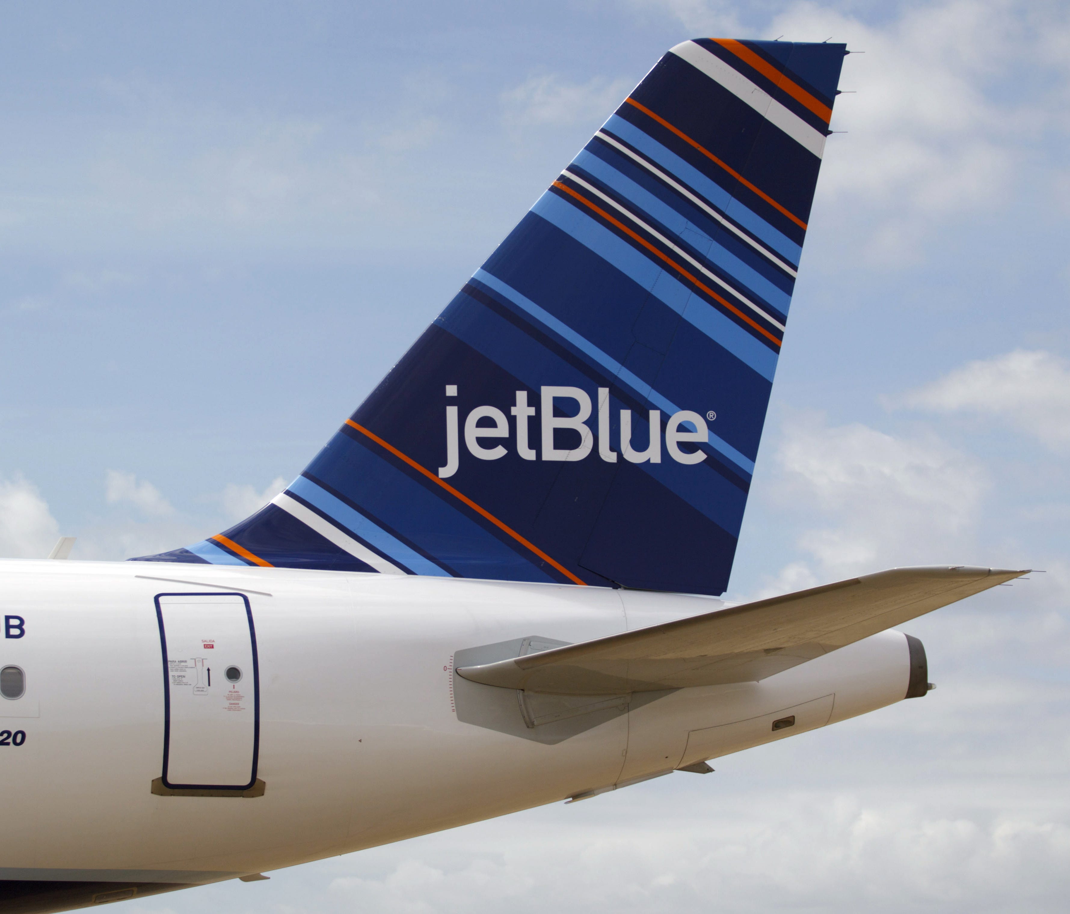 A JetBlue A320 is parked at Brookley Field near Mobile, Ala., on April 8, 2013.