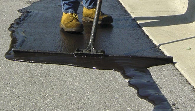 Coal tar is applied to asphalt to seal it.  Springfield Striping & Sealing no longer uses a coal tar product.