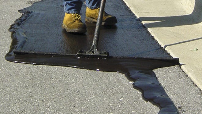 City weighs costs, benefits of curbing coal tar sealant use in Springfield