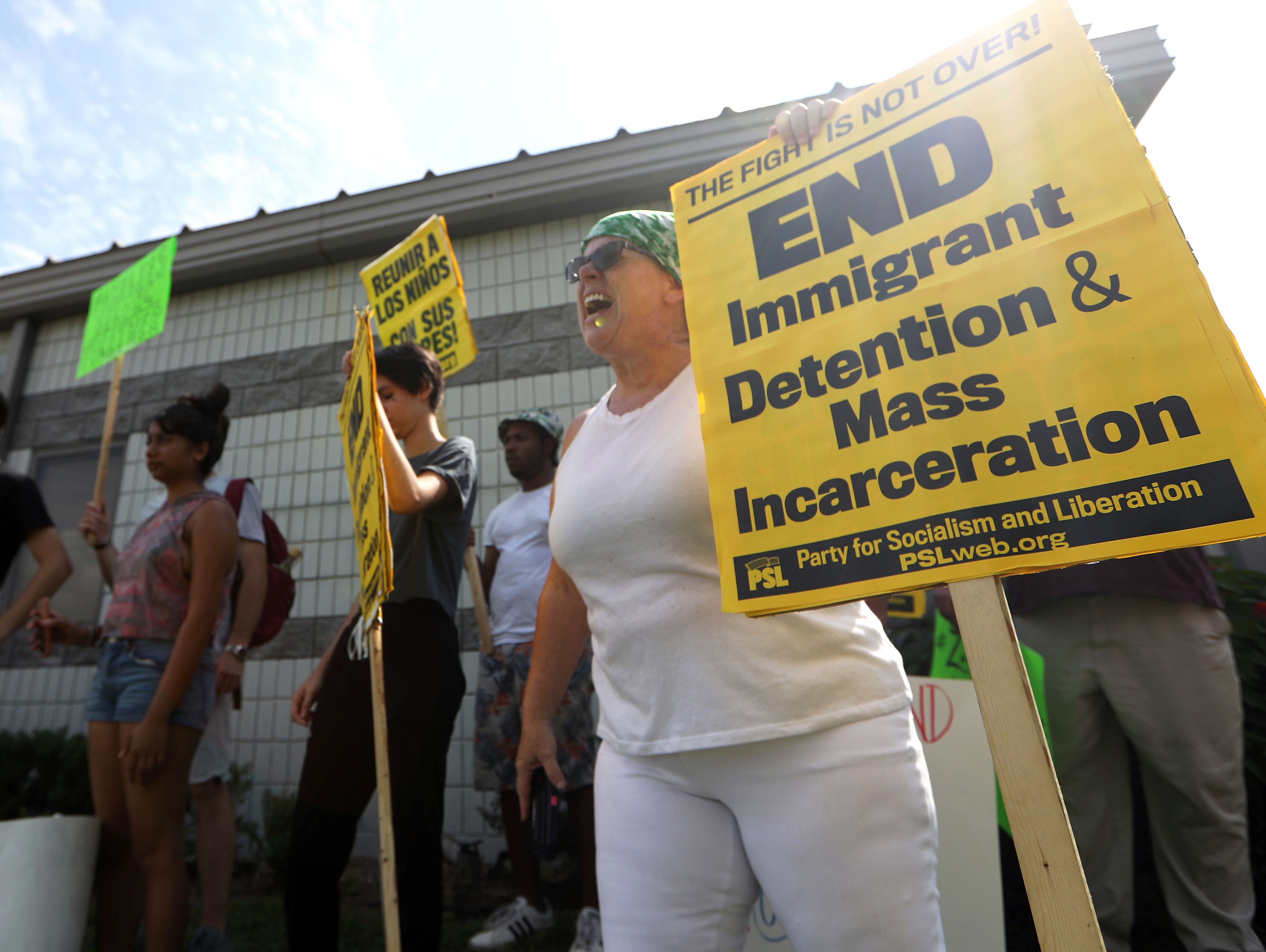 Nancy Imperiale, right, joins around 30 people gathered