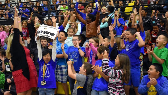 Fourth graders from Holloman Middle School cheer for their teachers during the Straight "A" Express rally Friday. When school grades came out in August, Holloman Middle School ranked No. 9 in New Mexico.