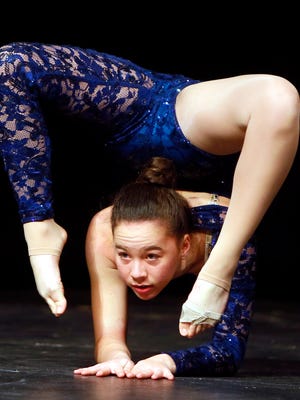 13-year-old Allison Chong of Morris Twp performs acrobatic dance routine during the Morristown Onstage auditions, taking place at Morristown High School and open to performers who live or work in the Morristown area. Finalists take the stage in front of a sell out crowd at the Mayo Center for the Performing Arts, last year, the annual show raised $126,000 for the school district. December 15, 2017. Morristown, New Jersey