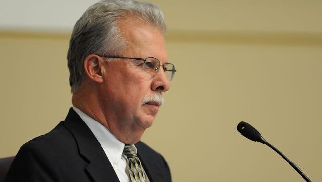 A file photo showing Washoe County Family Court Judge David Humke. The photo was taken in 2014 and shows Humke, who at that time was a Washoe County commissioner, listening to public comment.