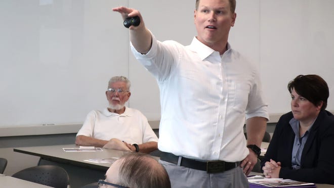 U.S. Rep. Steve Watkins, R-Kan., makes a point during a 2019 town hall meeting in Topeka, Kan. Watkins, a Kansas congressman facing felony voting fraud charges, told a detective he didn't vote in a 2019 Topeka city council election, according to an affidavit in support of criminal charges. Freshman Rep. Watkins is facing three felony charges.