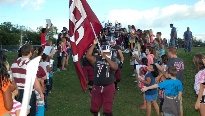 More than 150 children from the Boys & Girls Clubs of Springfield attended an Evangel University football game on Sept. 26. Each club member was paired with at least one Evangel student for the evening, and they especially enjoyed forming a massive welcome line for the team as they entered the field.