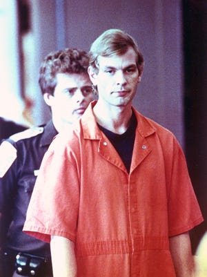 Accused serial killer Jeffrey L. Dahmer walks into the Milwaukee County Court, Wis., on Tuesday, Aug. 6, 1991.