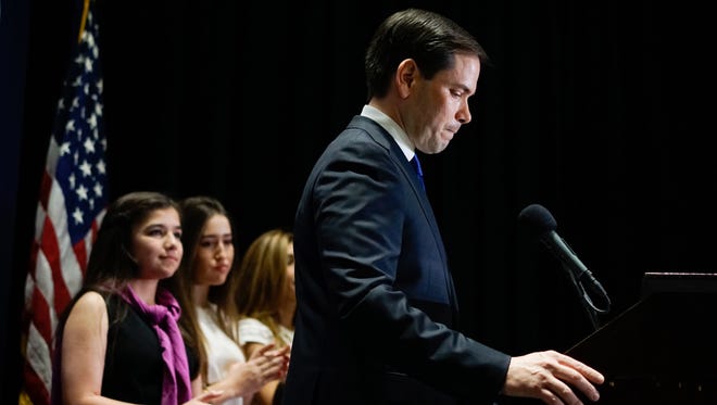 Republican presidential candidate U.S. Senator Marco Rubio (R-FL), flanked by his family, speaks at a primary night rally on March 15, 2016 in Miami, Florida.  Rubio announced he was suspending his campaign after losing his home state of Florida to Republican rival Donald Trump.