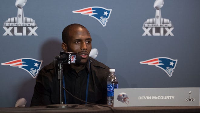 New England Patriots free safety Devin McCourty (32) addresses the media during a press conference after their arrival in preparation for Super Bowl XLIX at the Sheraton Wild Horse Pass Hotel in Chandler on Jan. 26.