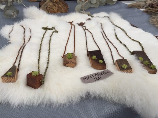 Reclaim Supply makes these necklaces from reclaimed wood and preserved reindeer moss.