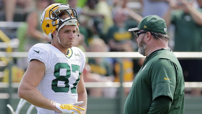 Green Bay Packers wide receiver Jordy Nelson (87) talks with head coach Mike McCarthy during training camp at Ray Nitschke Field.