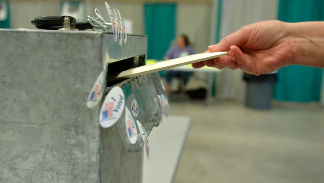 The voters cast their ballots at Exhibition Hall during Montana's primary election on Tuesday.