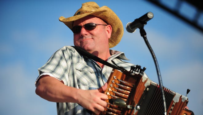 In this file photo, Jamie Bergeron of Jamie Bergon and the Kickin' Cajuns performs during Uniting Acadiana: Festival de Musique.