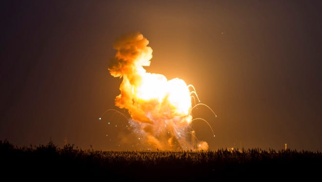 
This image provided by NASA shows the Orbital Sciences Corporation Antares rocket, with the Cygnus spacecraft on board, exploding moments after launch from the Mid-Atlantic Regional Spaceport at NASA's Wallops Flight Facility in Virginia.
