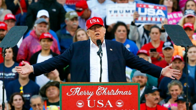 In this Dec. 17, 2016, photo, President-elect Donald Trump speaks during a rally at the Ladd–Peebles Stadium in Mobile, Ala. Trump will be the first U.S. president to have ever owned a casino, and the gambling industry is wondering how he will handle three major issues: internet gambling, sports betting and daily fantasy sports. The industry has sent its wish list to the president-elect. (AP Photo/Brynn Anderson)
