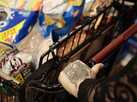 More than half of Americans in a recent survey say they plan to stock up on groceries amid concerns about another COVID-19 surge and possible political unrest.