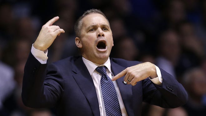 Butler Bulldogs head coach Chris Holtmann calls a play to his players in the second half of their game Wednesday, Mar 2, 2016, evening at Hinkle Fieldhouse in Indianapolis. The Butler Bulldogs defeated the Seton Hall Pirates 85-78.
