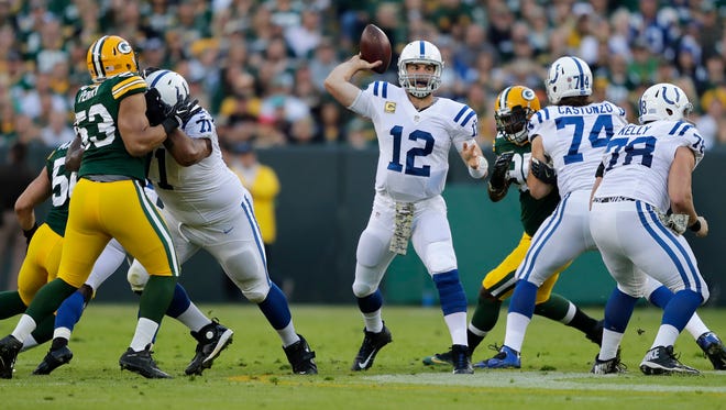 Indianapolis Colts' Andrew Luck throws as the Green Bay Packers host the Indianapolis Colts on Sunday, November 6, 2016, at Lambeau Field in Green Bay, Wis.