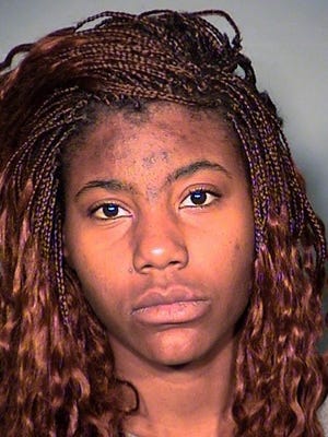 A photo provided by the Las Vegas Metropolitan Police Department shows Lakeisha Holloway, 24, in a booking photo on Dec. 20, 2015.