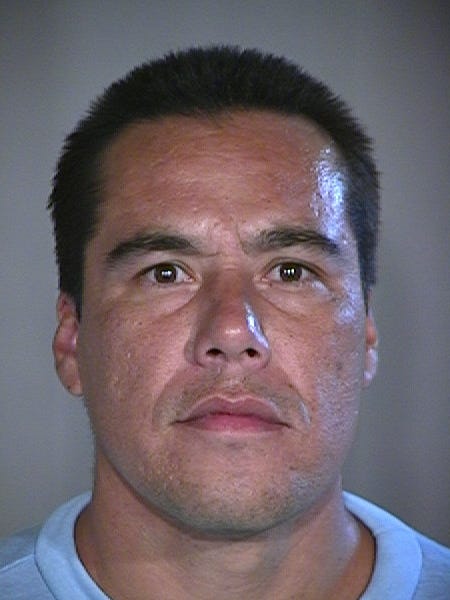 Phoenix man convicted in deaths of 2 found buried in mom's backyard