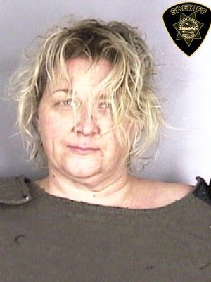 Meagan Lafferty, 43, of Salem, was arrested on suspicion of strangling her neighbor's puppy.