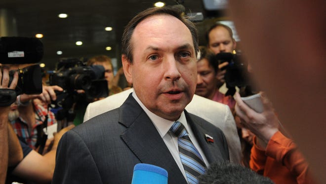 Pro-Kremlin lawmaker Vyacheslav Nikonov speaks with journalists before his meeting with U.S. National Security Agency (NSA) fugitive leaker Edward Snowden  inside the terminal F of Moscow's Sheremetyevo airport, on July 12, 2013.