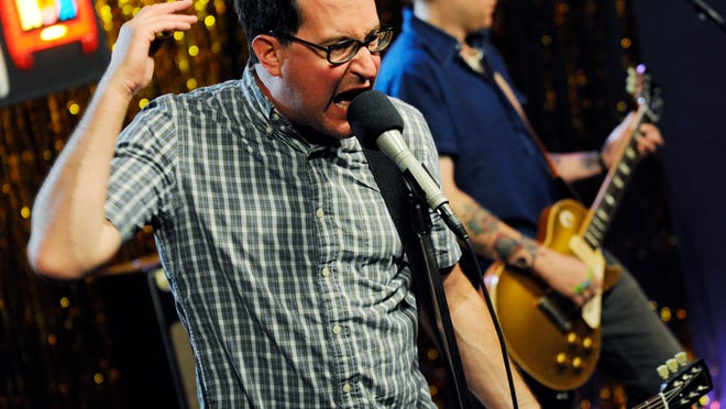 Craig Finn (left) and Tad Kubler of The Hold Steady perform during a taping for The New Now on Yahoo! Music in 2009 in Santa Monica, Calif.