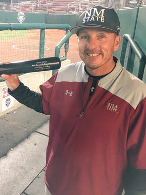 New Mexico State baseball coach Brian Green won his 100th career game with a road victory over rival New Mexico on Tuesday night in Albuquerque.