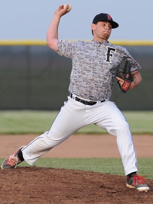 Falcon senior Cole Fesler pitches in IHSAA sectional play Wednesday at Frontier.