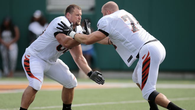 Cincinnati Bengals and guard Kevin Zeitler, left, could not come to terms on a contract before the start of the 2016 regular season.
